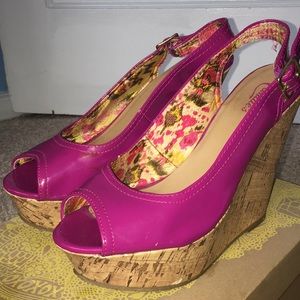 Candie’s patent leather peep toe wedges